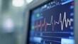© Plaifah - A close-up of an ECG monitor displaying a clear heart rate waveform, with digital readouts and a clean white background, highlighting the precision of heart monitoring.