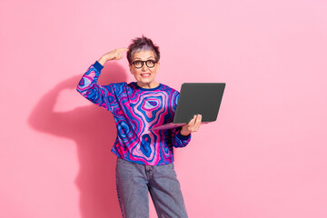 Sticker - Photo portrait of attractive senior woman netbook confused scratch head dressed blue colorful clothes isolated on pink color background