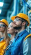 © Exnoi - A team of engineers in a high-tech manufacturing facility, inspecting machinery and discussing production processes, with industrial equipment in the background
