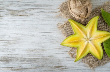 Wall Mural - Starfruit on Wooden Background