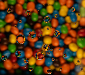 Colored Cany and water drops for abstract or background