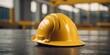 © Ta Sher - Engineering concept with hard hat on yellow background with copy space.