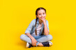 © deagreez - Photo of cheerful glad adorable pretty girl wear stylish denim clothes isolated on yellow color background