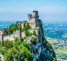 A close up view of the first tower in the fortified section of San Marino, Italy in summertime