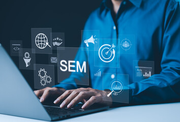 Wall Mural - sem search engine marketing concept. businessman is working with virtual icons, search engine market