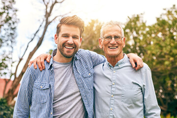 Poster - Man, father and outdoor portrait with hug, vacation and support in relationship connection. Son, senior dad and together for security embrace in countryside, love and retirement travel for bonding