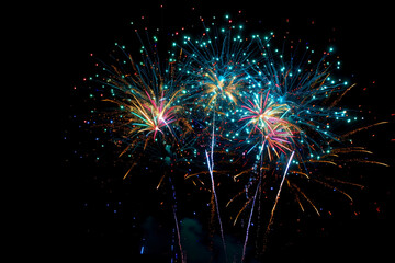 wonderful vivid multicolor fireworks exploding on black night sky