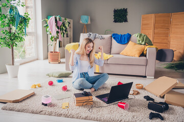 Wall Mural - Photo of lucky cheerful lady wear casual shirt enjoying mess winnin game modern gadget indoors room home house