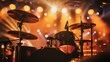 © BajimBa - A drum kit with drums and cymbals on stage under floodlights