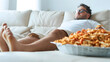 © A2Z AI  - Overweight Man Sitting on Sofa Eating Junk Food, Unhealthy Lifestyle and Comfort Eating Concept