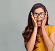 © AK Coop/peopleimages.com - Woman, glasses and surprised in studio for idea, problem solving and brainstorming with choice. Female person, editor and shocked on white background for decision, vision and creative inspiration