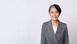 © ochikosan - 60代のスーツを着たアジア人女性のポートレート。（Portrait of an Asian woman in her 60s wearing a suit.）