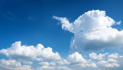 Wall Mural - serene blue sky with fluffy white clouds in bright daylight