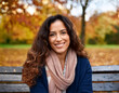 © Ranta Images - Happy Woman's Autumn Portrait: Outdoor Headshot with Smiling Expression and Copyspace