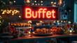 © pawimon - A vibrant buffet display featuring neon sign, delicious food, and drinks, creating festive atmosphere.