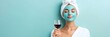 © ratatosk - Young woman with mistrusting facial mask and glass of red wine in blue bathroom. Relaxing at home or spa. Facial treatment, skincare. Self care, cosmetic and beauty concept for design