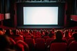 © InfiniteStudio - People in red chairs watching a movie on a blank screen in a cinema hall with a blurred audience atmosphere