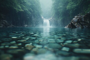 Poster - Tranquil Waterfall Cascading Into a Still Pool Surrounded by Foggy Forest