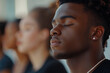 © Peter - Mindful Meditation: Teenage Boy Surrounded by Meditators in Sunlit Yoga Studio, Creating a Calm and Peaceful Ambiance
