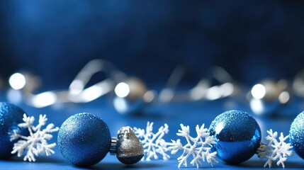 Wall Mural - blue christmas background with snowflakes and christmas balls. copy space backgrounds