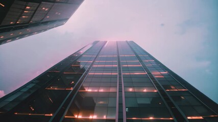 Poster - A towering futuristic skyscraper illuminates the night sky with its glowing lights, A futuristic skyscraper glowing in the night sky