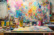 © AungThurein - An artist’s studio filled with canvases, brushes, and paint splatters