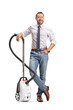 © Ljupco Smokovski - Man standing with a vacuum cleaner