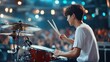© cloud7days - Asian men playing a drum set in a dynamic concert, their beats resonating through the crowd.