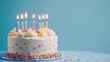 © Naturalis - Delightful Birthday Cake with Colorful Candles and Sprinkles