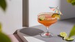 © Kartik - Close up view of alcohol margarita cocktails with lime on grey surface on white