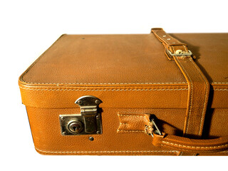 A brown leather suitcase with a silver lock. The suitcase is on a white background. Old style subject used for tourism and travel.