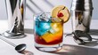 © Kartik - Glass of tasty Long Island iced tea, ice cubes and bartender tools on light background
