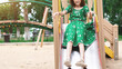 © Mariia - cute smiling little girl on a playground on summer day