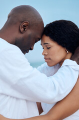 Wall Mural - Black couple, love and forehead touch at beach for care, trust and travel together on date. Man, woman and romance with eyes closed outdoor for connection, loyalty and commitment on summer holiday