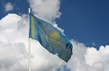 The national flag of Kazakhstan in wind