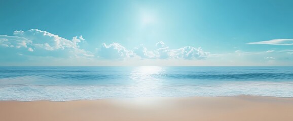 Tranquil ocean with white sand beach and blue sky with clouds on a sunny day.