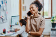 © peopleimages.com - Woman, smile and phone call in creative office for startup, artist and talk for small business agency. Designer, discussion and art director happy with project, planning and entrepreneur goals