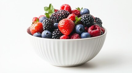 Wall Mural - Close-up of a white ceramic bowl brimming with fresh, colorful berries, isolated on a pure white background.