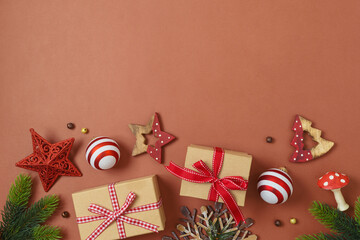 Wall Mural - Vintage Christmas background with gift box and decorations. Retro ornaments composition. Top view, flat lay