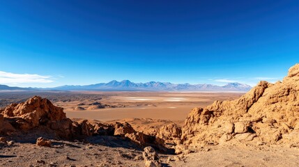 The breathtaking expanse of the Atacama Desert, Chile, with its vast salt flats and distant mountain ranges