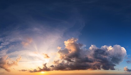 Poster - beautiful panoramic sky with glowing clouds at sunset