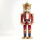 © Wuttichai - Lone Ornate Christmas Nutcracker Soldier Against Pure White Backdrop with Dramatic Lighting
