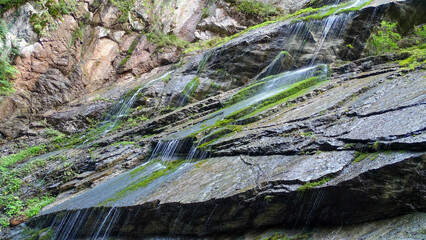 Water flowing by moss rocks, September 24, 2019.