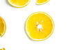 © Cahya - Orange fruit slices isolated on white background. Top view. Flat lay.