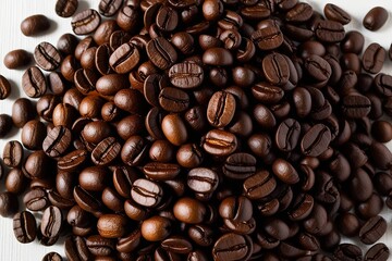 Wall Mural - Coffee Beans on a White Background Essential Ingredients for Your Morning Caffeine Boost