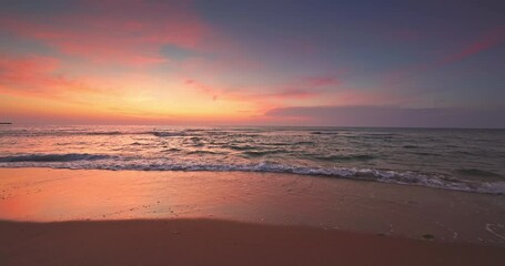 Poster - Scenic sea sunrise, sun dawn color sunset, ocean water waves rolling onto sandy beach of seashore video