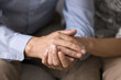 © fizkes - Close up older spouses holding hands, gesture of love, compassion and empathy. Loving wife supporting her husband in difficult life period, incurable disease news, health concerns, age-related crisis