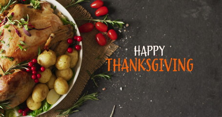 Wall Mural - image of happy thanksgiving text and dinner on grey background