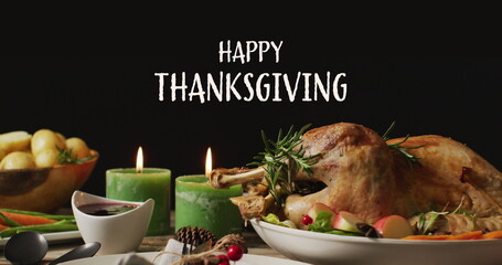 Sticker - Image of happy thanksgiving text and dinner and candles on black background