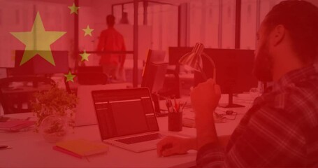 Poster - Chinese flag animation over office workers using computers and collaborating